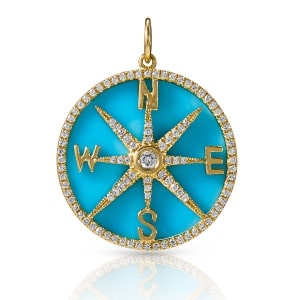 A turquoise compass charm for a necklace by Anne Sisteron.
