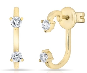 A pair of reverse drop earrings from Anne Sisteron features diamonds.