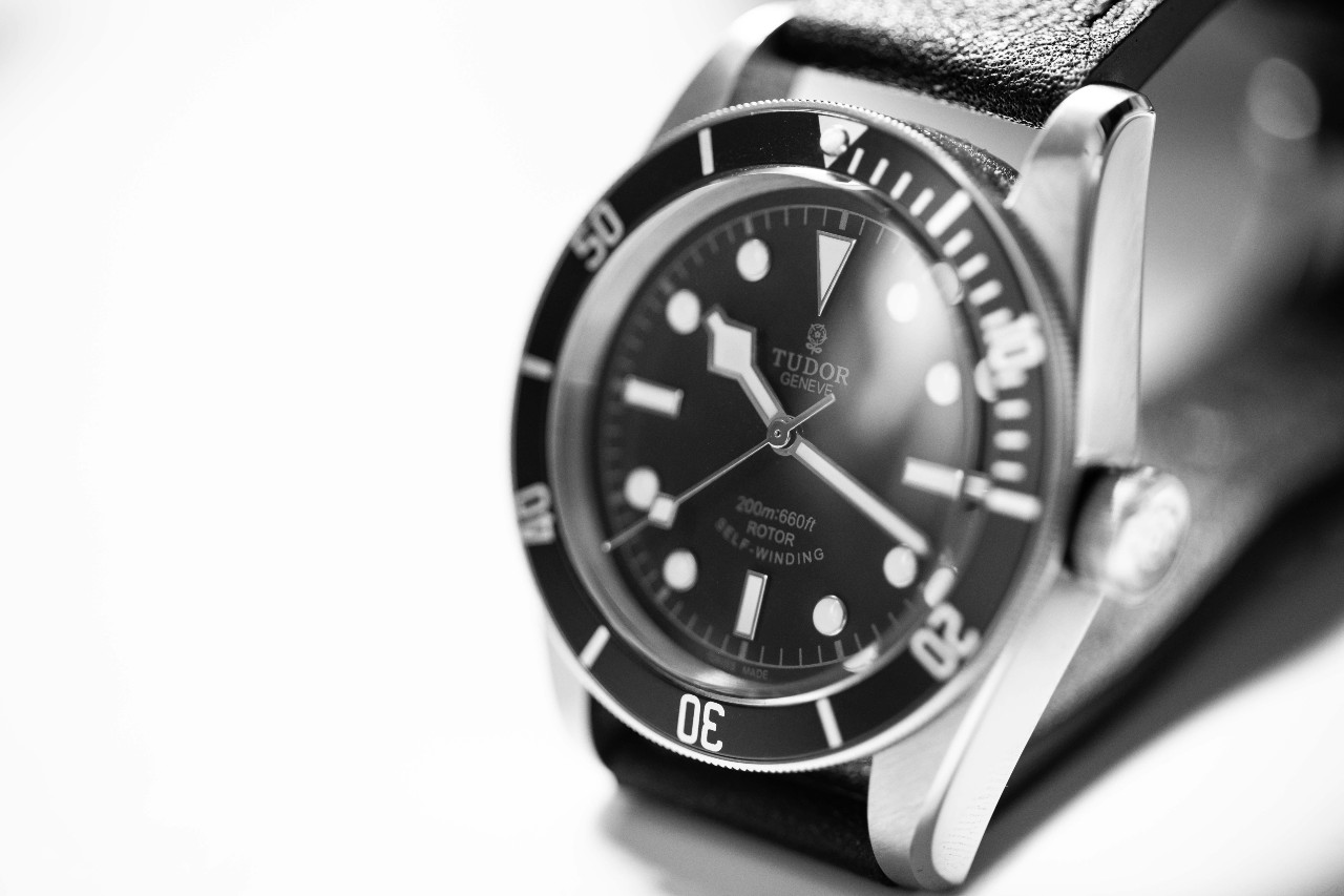 close up image in black and white of a TUDOR Black Bay watch