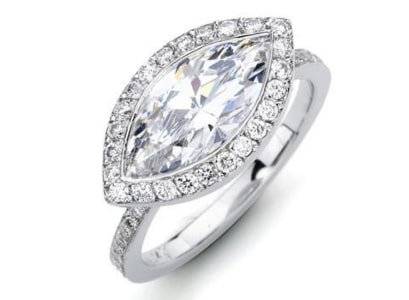 A halo marquise-cut diamond engagement ring from Kirk Signature.