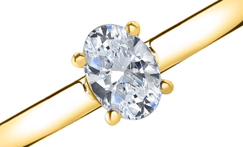 A simple yet elegant yellow gold solitaire engagement ring with an oval center stone, available at Kirk Jewelers.