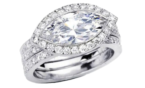 An ornate white gold halo engagement ring with a marquise center stone, available at Kirk Jewelers.