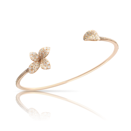 A rose gold open white and champagne diamond bracelet with floral motifs.