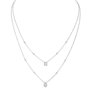 A layered duo of white gold necklaces from Messika.