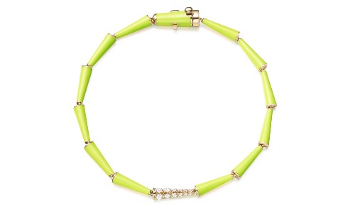 Bracelet with green segmented links by Lola.