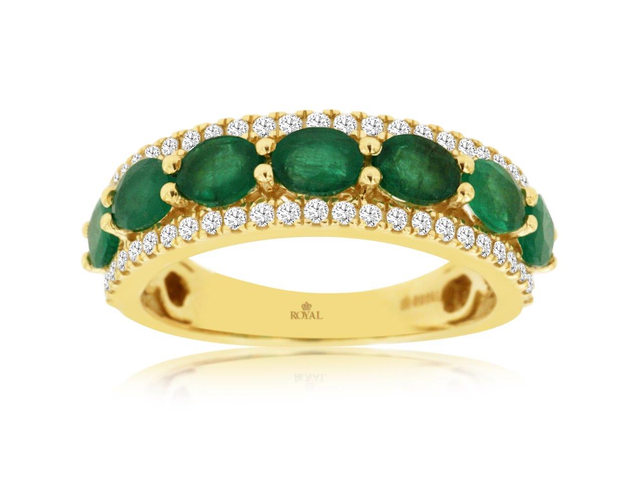 An exquisite yellow gold emerald ring.