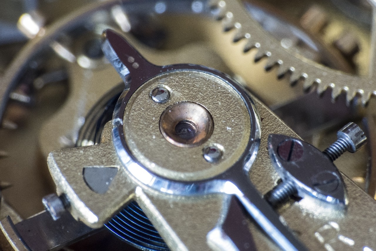 A close up of a watch’s gear.