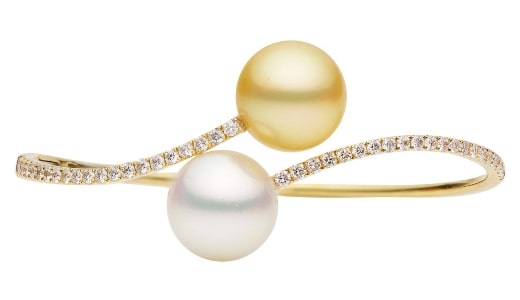 A pearl bangle with diamond accents from Kirk Couture.